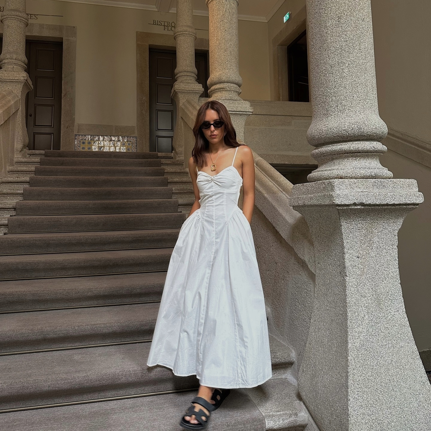 Debora Rosa in a white Nia dress