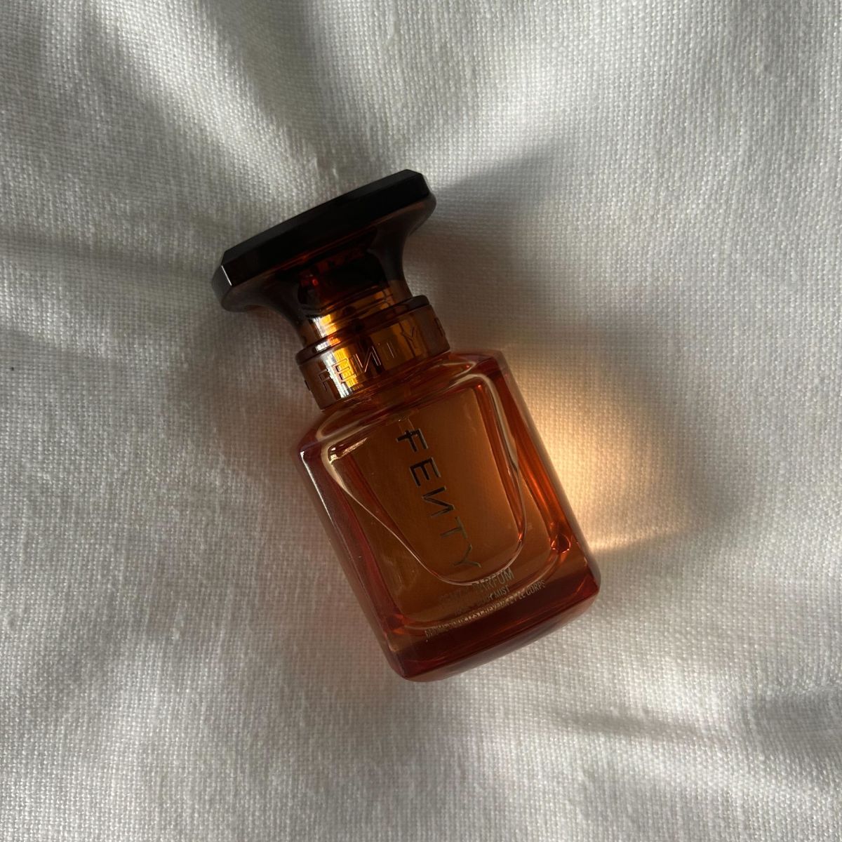 Junior beauty editor Grace Lindsay testing the Fenty Hair & Body Mist